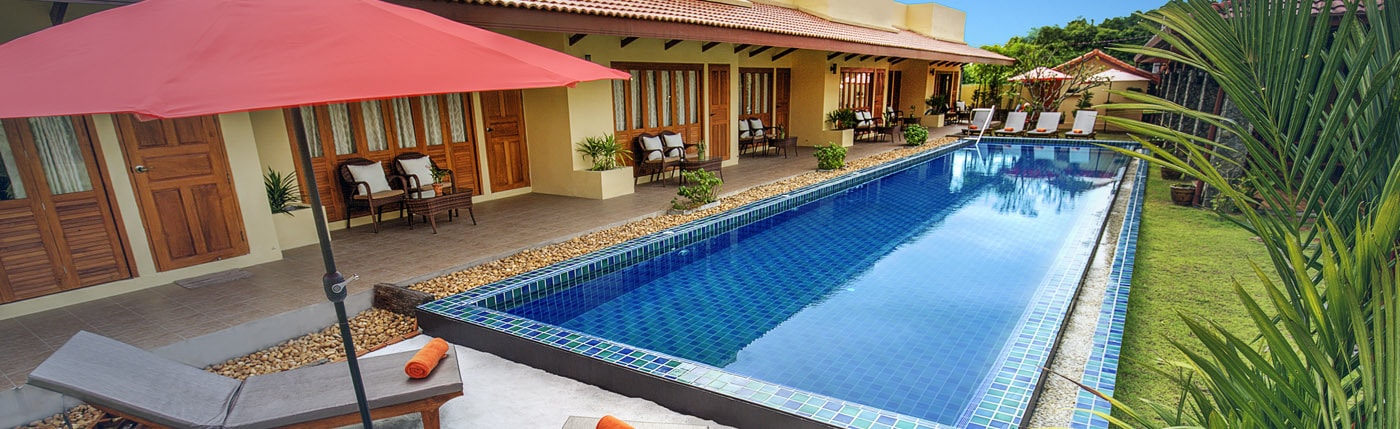 Villa exterior with tropical garden